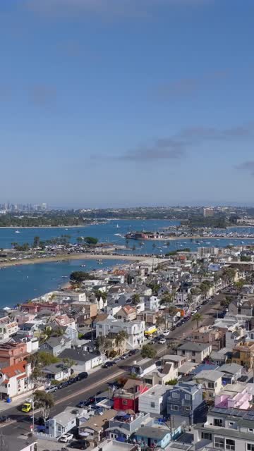 Aerial view of a residential street, boats and the bay in Mission Bay.
