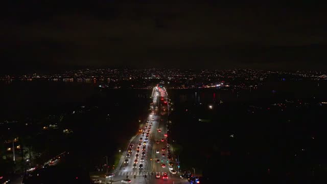Aerial view of the downtown streets, the bridge and the bay in Mission Bay.