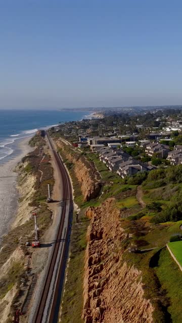 Aerial view of the cliffs, the ocean and homes at Torrey Pines.