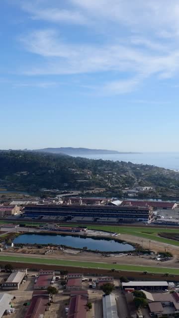 Aerial view of the country inland, the ocean and homes in Del Mar.