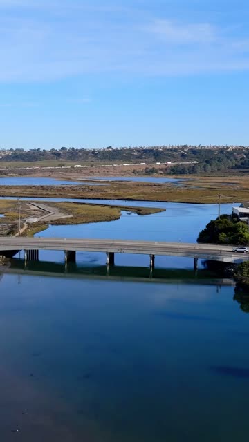 Aerial view of the country inland, the bridge and traffic in Del Mar.