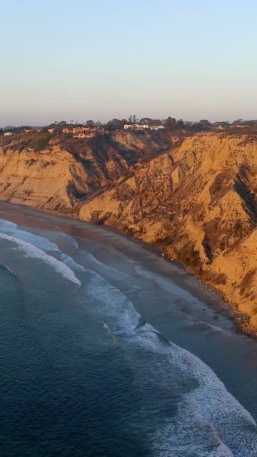 Aerial view of the cliffs, the ocean and homes at Black’s Beach.
