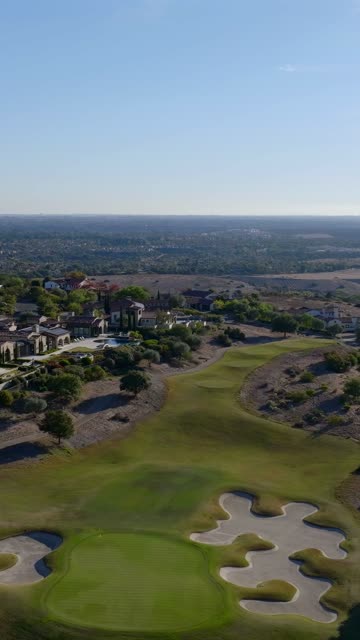 Aerial view of the country inland, homes and the buildings in Santaluz.