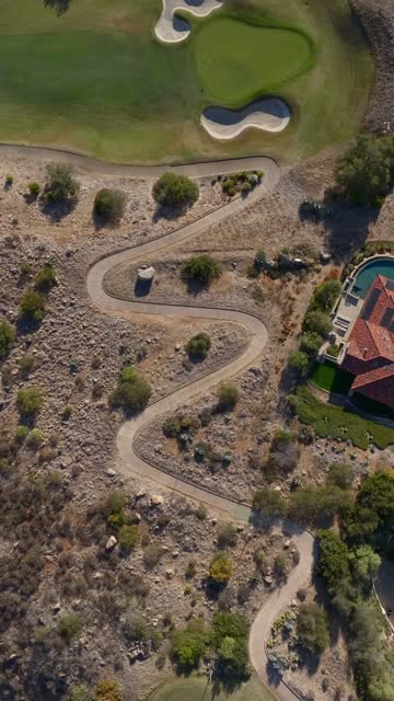 Aerial view of the country inland, homes and the buildings in Santaluz.