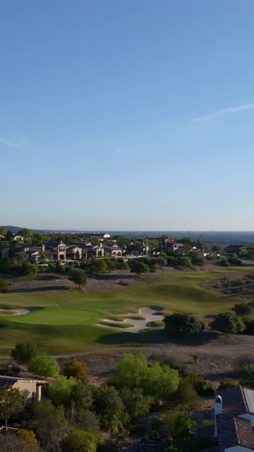 Aerial view of the country inland, homes and the buildings in Santaluz.