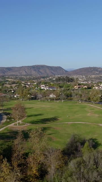 Aerial view of the country inland, homes and open country in Santaluz.