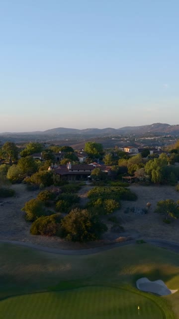 Aerial view of the country inland, homes and the buildings in Santaluz.