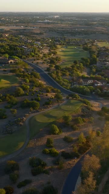 Aerial view of the country inland, homes and the buildings in Santaluz.