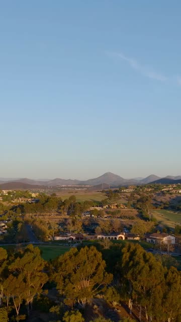 Aerial view of the country inland, homes and the buildings in Santaluz.