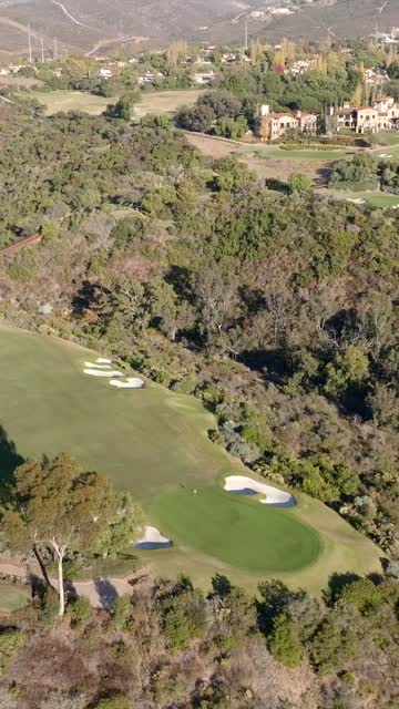 Aerial view of the country inland, homes and the buildings at The Bridges.