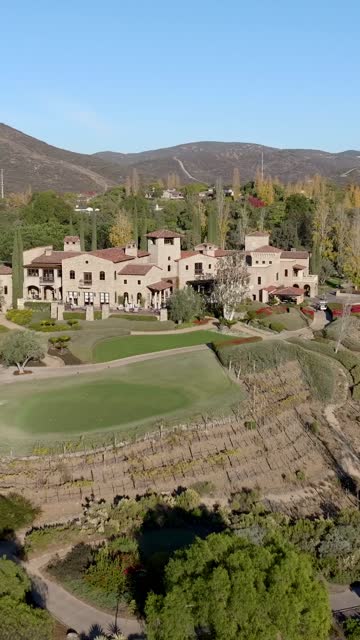 Aerial view of the country inland, homes and the buildings at The Bridges.