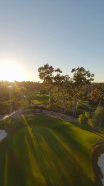 Low aerial view of a park and open country at Covenant.