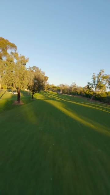 Low aerial view of a park and open country at Covenant.