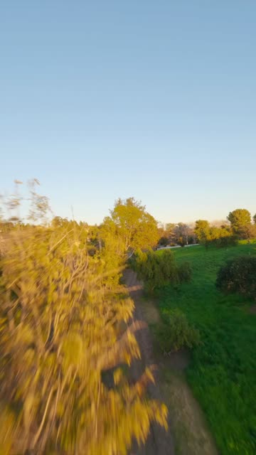 Low aerial view of the country inland and open country at Covenant.