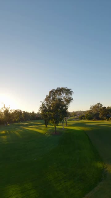 Low aerial view of a park and open country at Covenant.