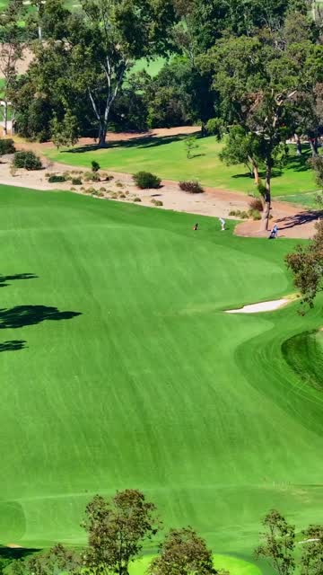 Aerial view of the country inland and open country at Covenant, with people walking.