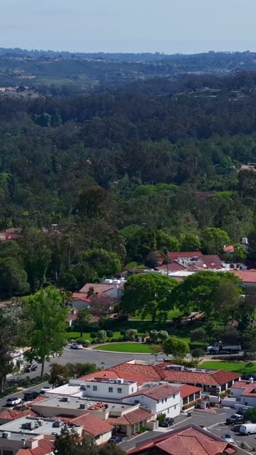 Aerial view of a residential street, homes and the buildings at Covenant.