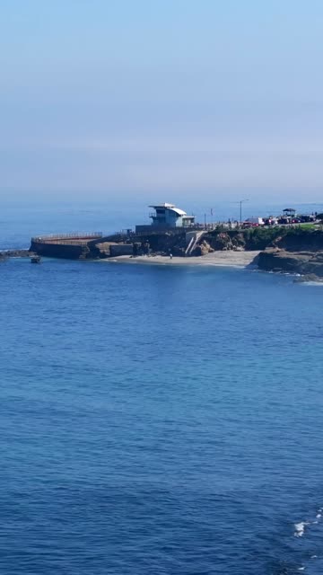 Aerial view of the cliffs, the ocean and the beach at Village of La Jolla.