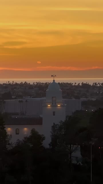 Vertical drone video of the Junípero Serra Museum in Presidio Park near Mission Hills San Diego California at sunset with warm golden light and historic architecture | Vertical Drone Video – 8