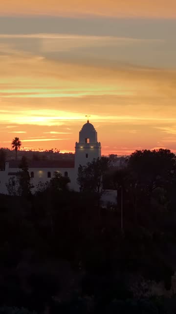Vertical drone video of the Junípero Serra Museum in Presidio Park near Mission Hills San Diego California at sunset with warm golden light and historic architecture | Vertical Drone Video – 9