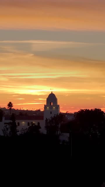 Vertical drone video of the Junípero Serra Museum in Presidio Park near Mission Hills San Diego California at sunset with warm golden light and historic architecture | Vertical Drone Video – 10