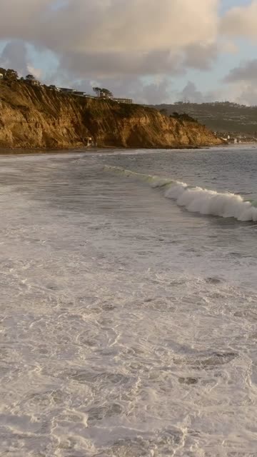 The cliffs, the surf and the ocean at Black’s Beach.