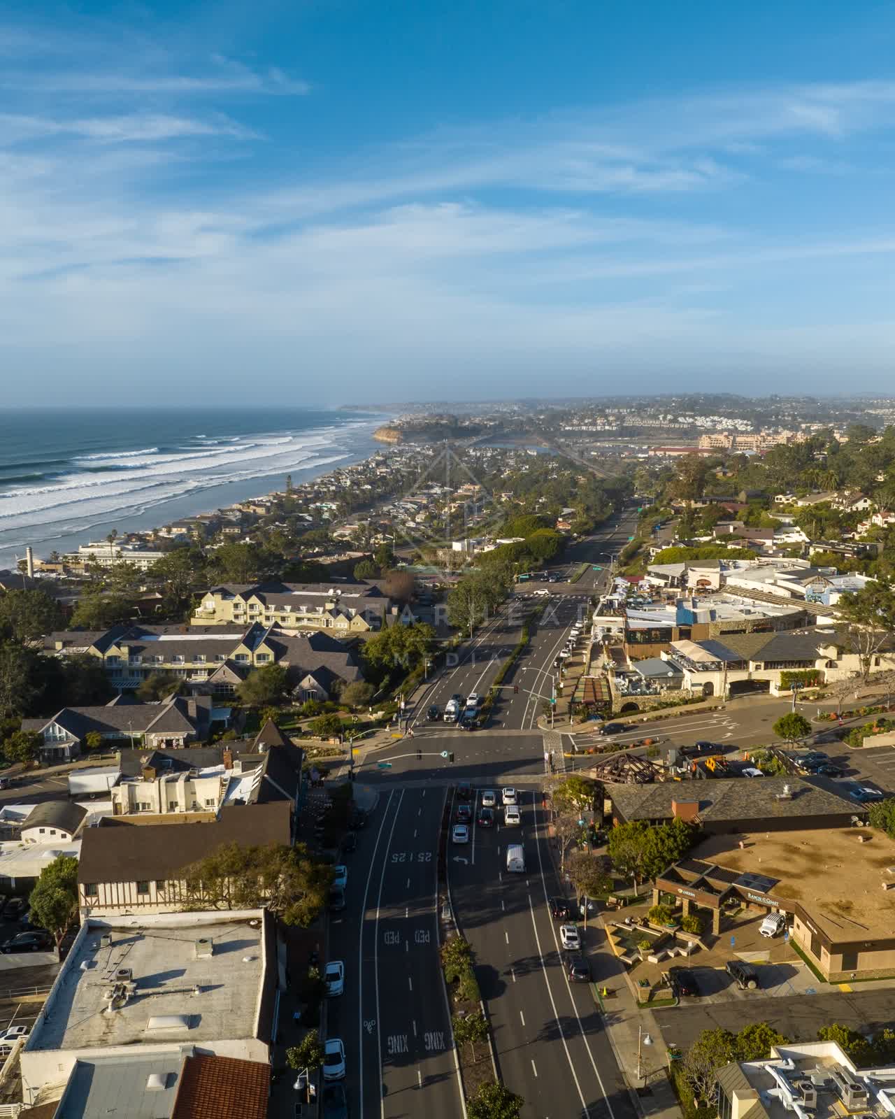 Aerial view of the beach, the surf and the ocean in Del Mar.