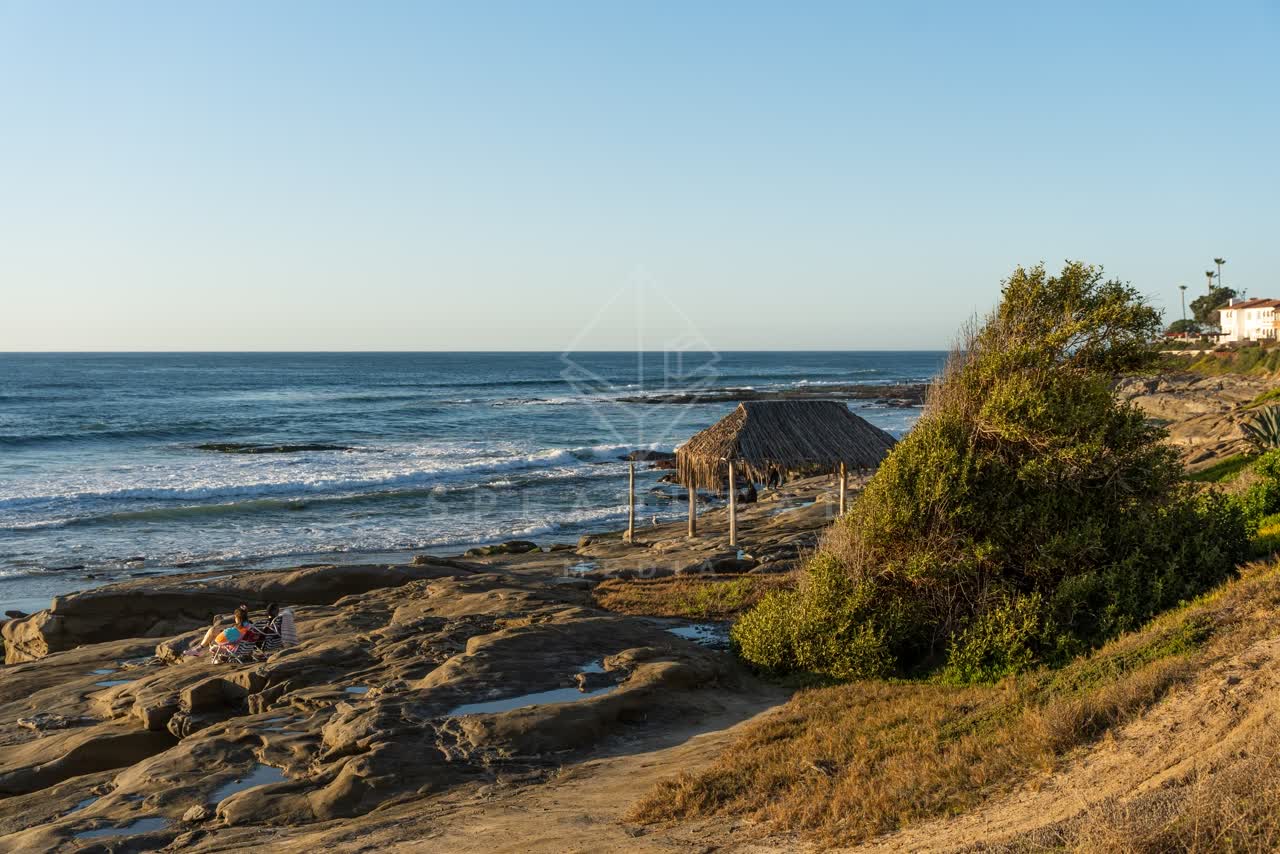Elevated view of the beach, the surf and the ocean at Windansea.