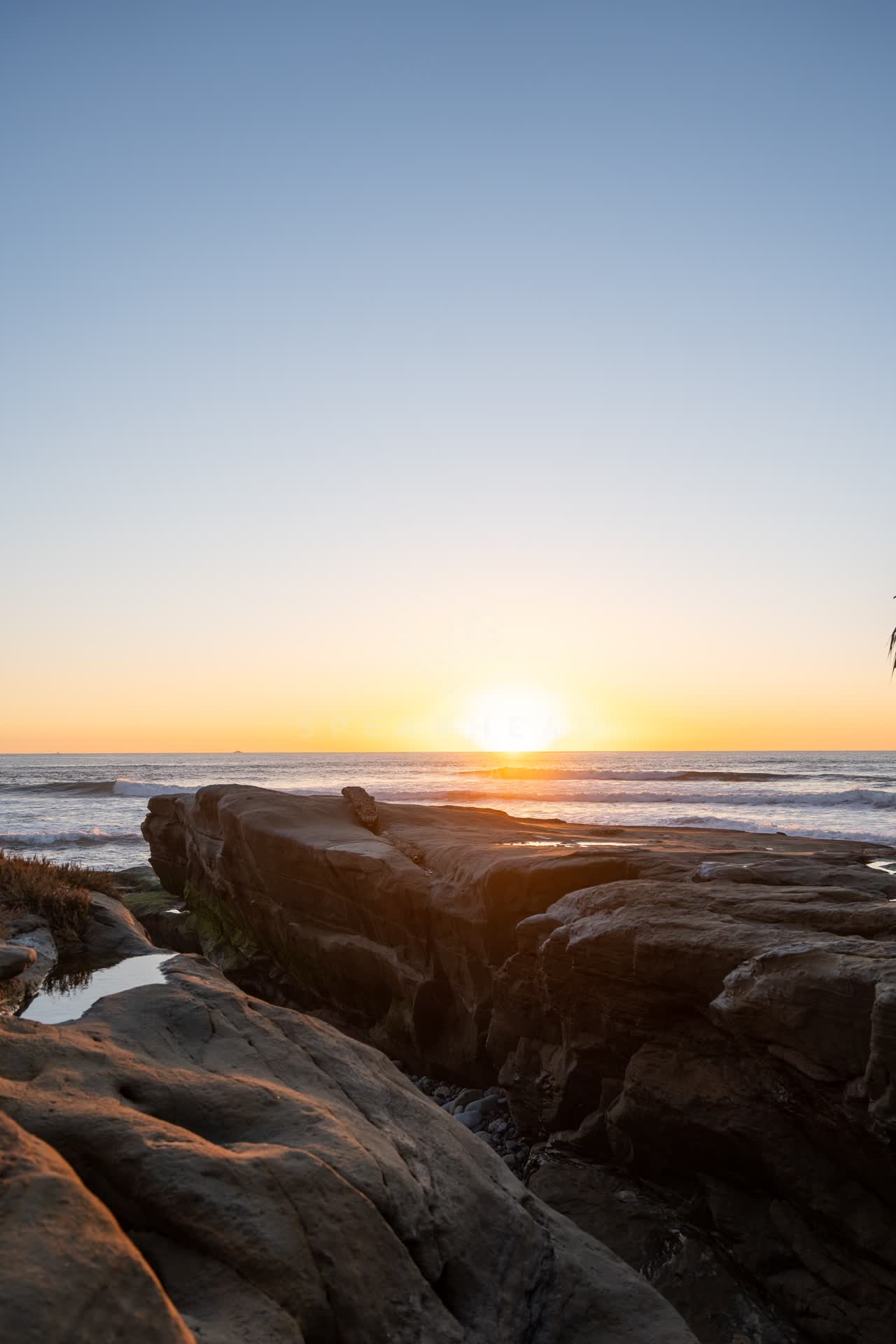 The cliffs, the surf and the ocean at Windansea.