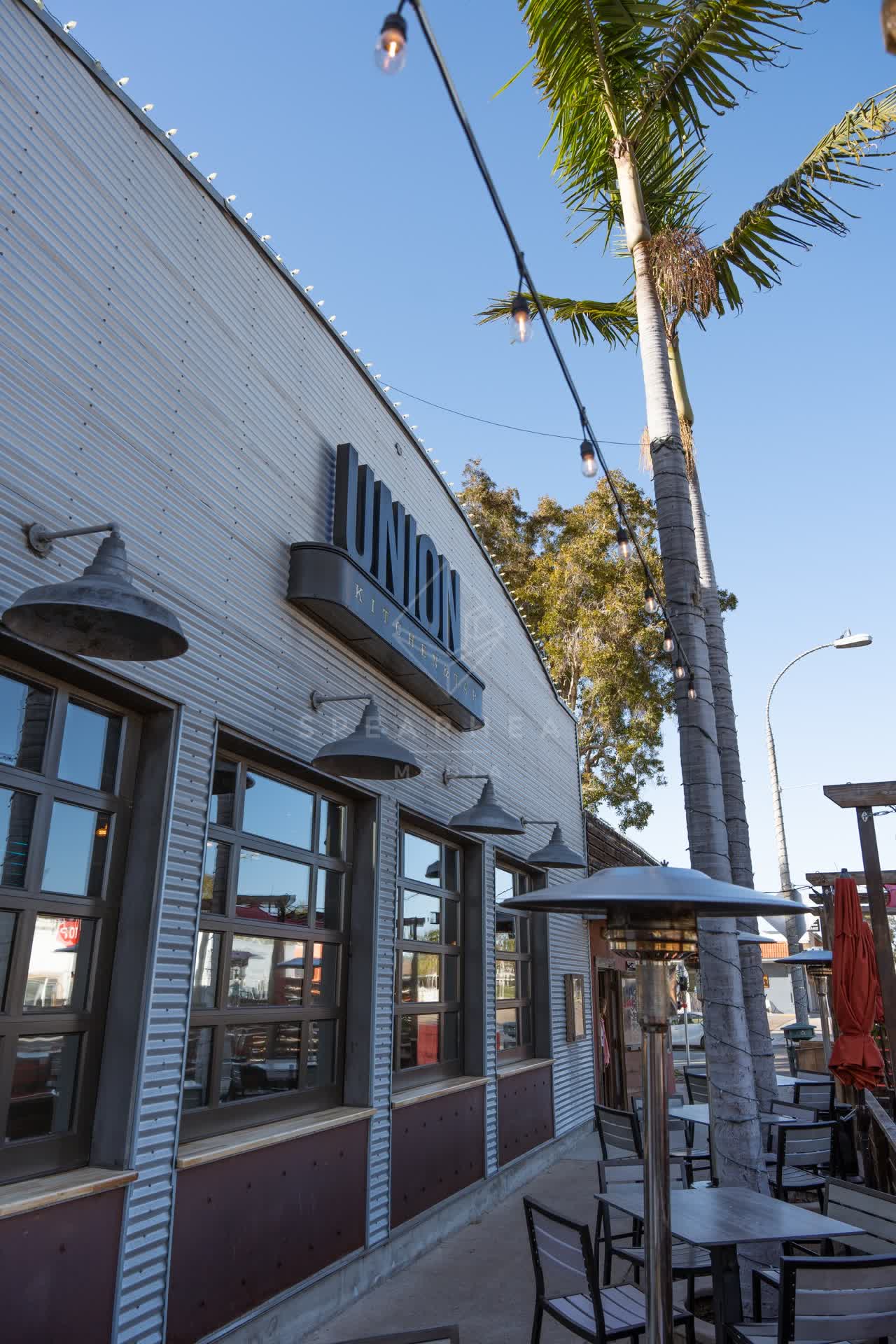 The downtown streets, palm trees and the buildings at Downtown Encinitas.