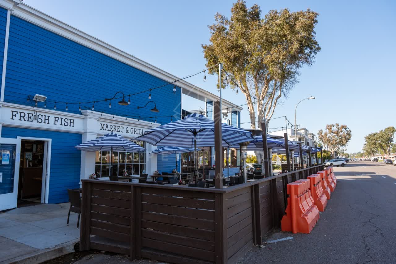 The downtown streets, the buildings and traffic at Downtown Encinitas.