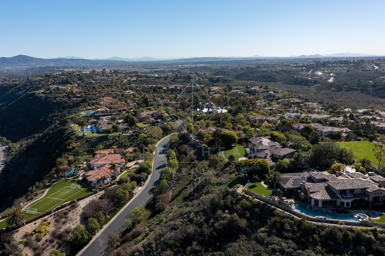 Aerial view of a residential street, homes and the buildings at Rancho Pacifica.