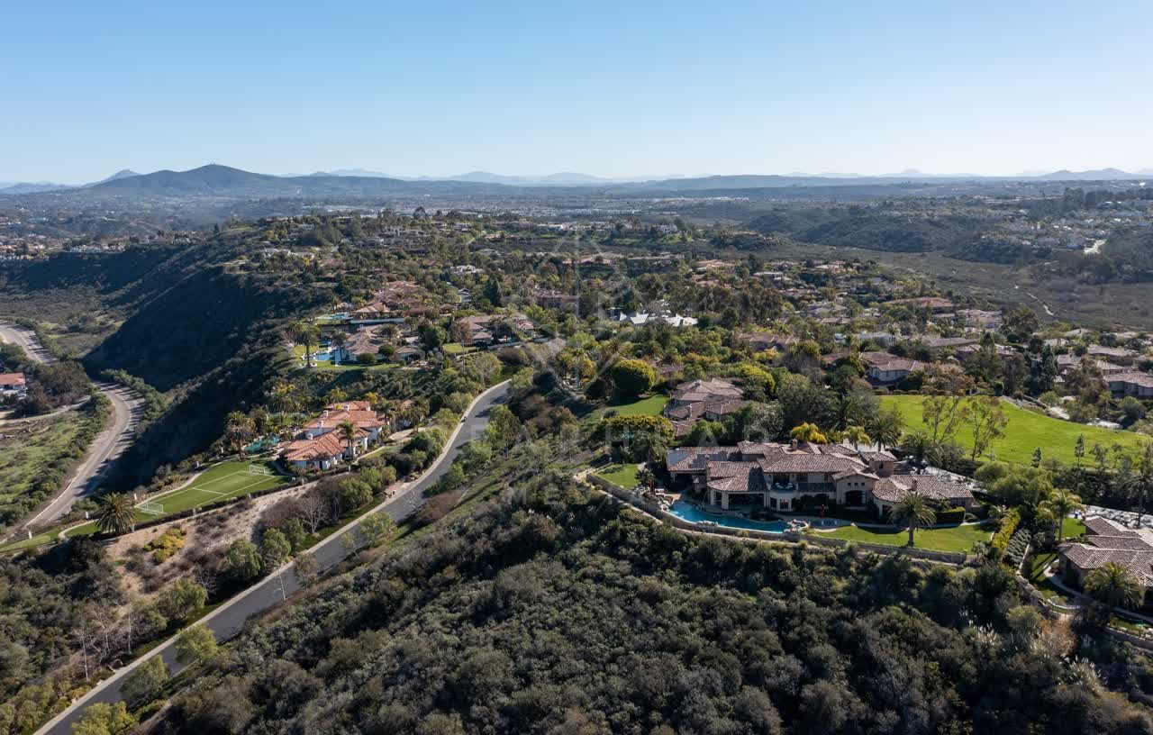 Aerial view of a residential street, homes and the buildings at Rancho Pacifica.