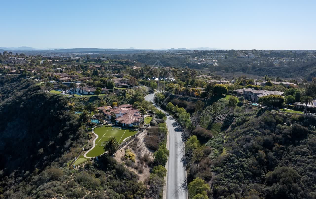 Aerial view of a residential street, homes and the buildings at Rancho Pacifica.