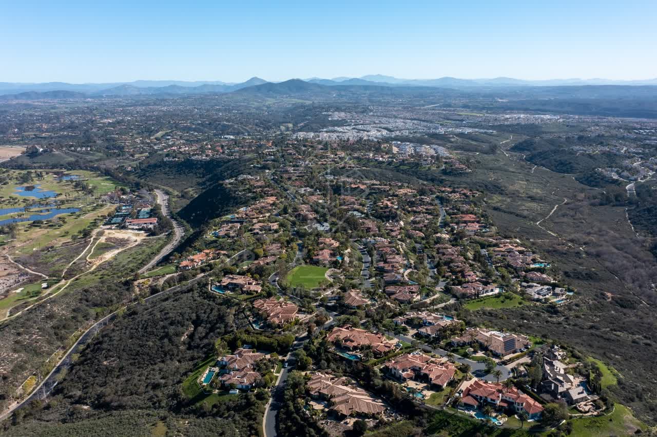 Aerial view of a residential street, homes and the buildings at Rancho Pacifica.