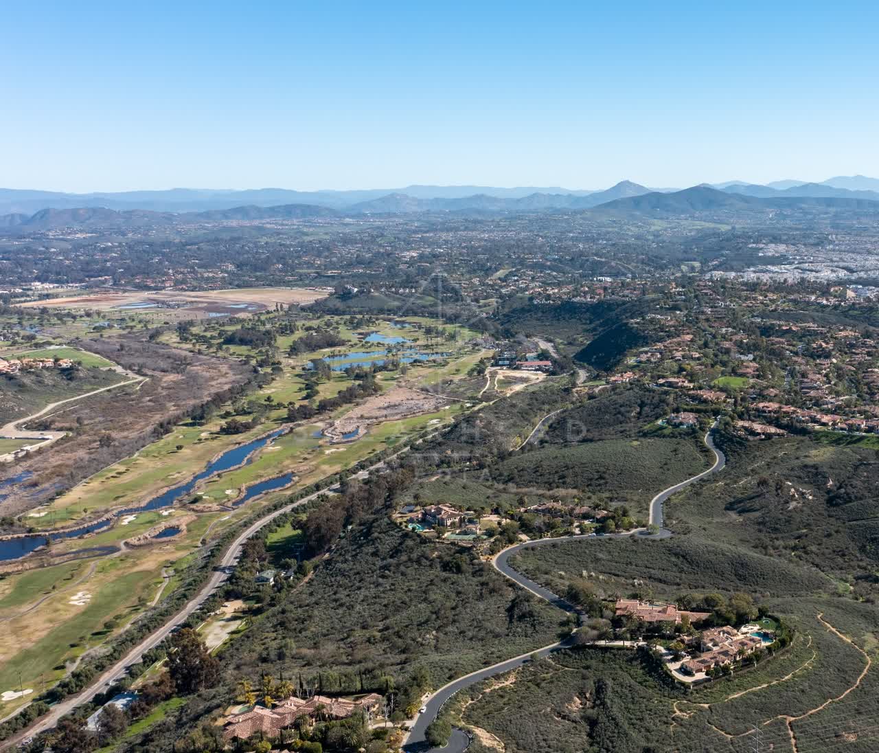 Aerial view of the country inland, homes and open country at Rancho Pacifica.