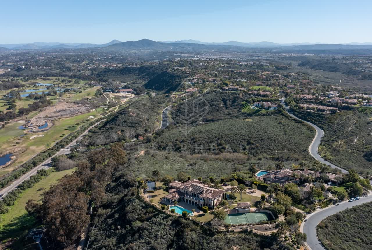 Aerial view of a residential street, homes and traffic at Rancho Pacifica.