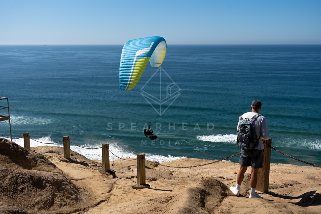 Elevated view of the cliffs, the surf and the ocean at Torrey Pines.