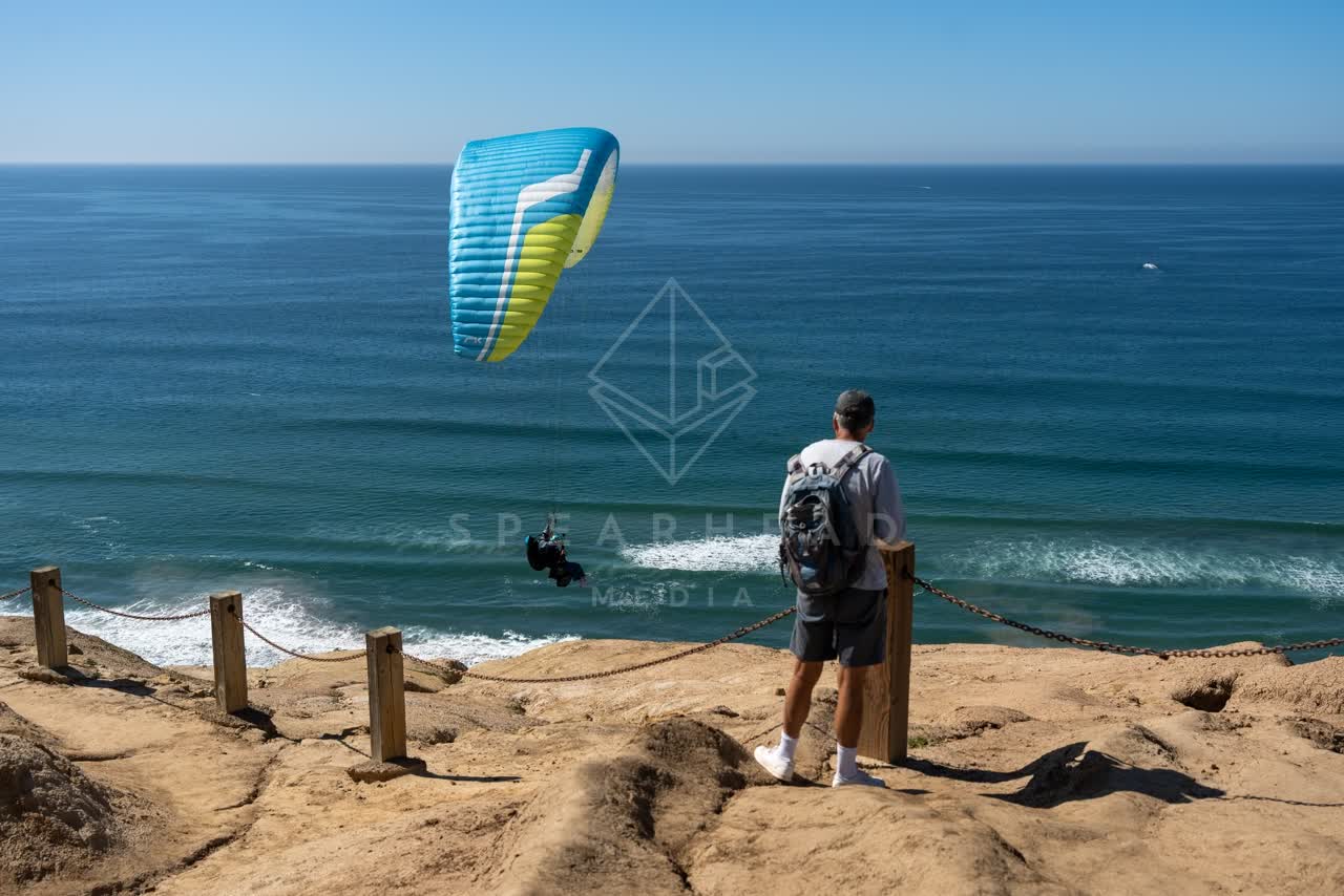 Elevated view of the cliffs, boats and the ocean at Torrey Pines.