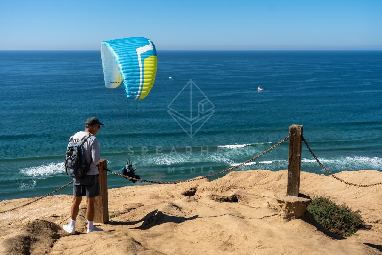 Elevated view of the cliffs, boats and the ocean at Torrey Pines.
