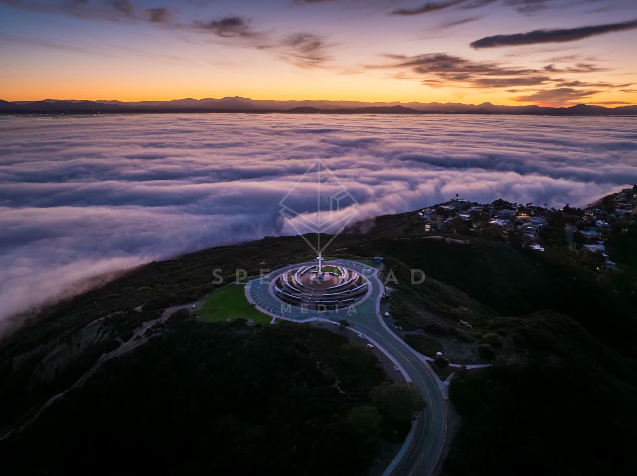 Aerial view of the cliffs, palm trees and homes at Mount Soledad.