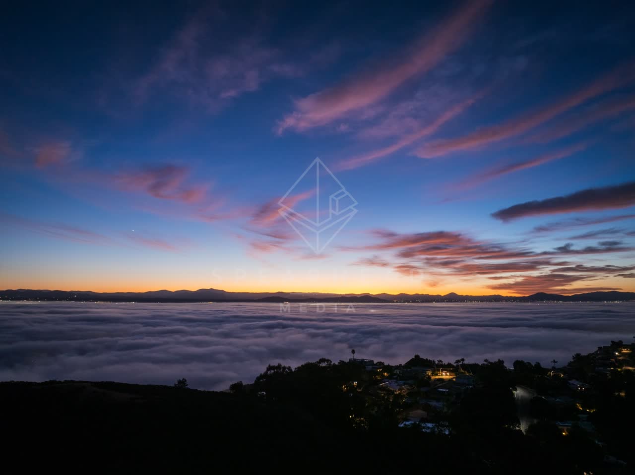 The cliffs, homes and open country at Mount Soledad.