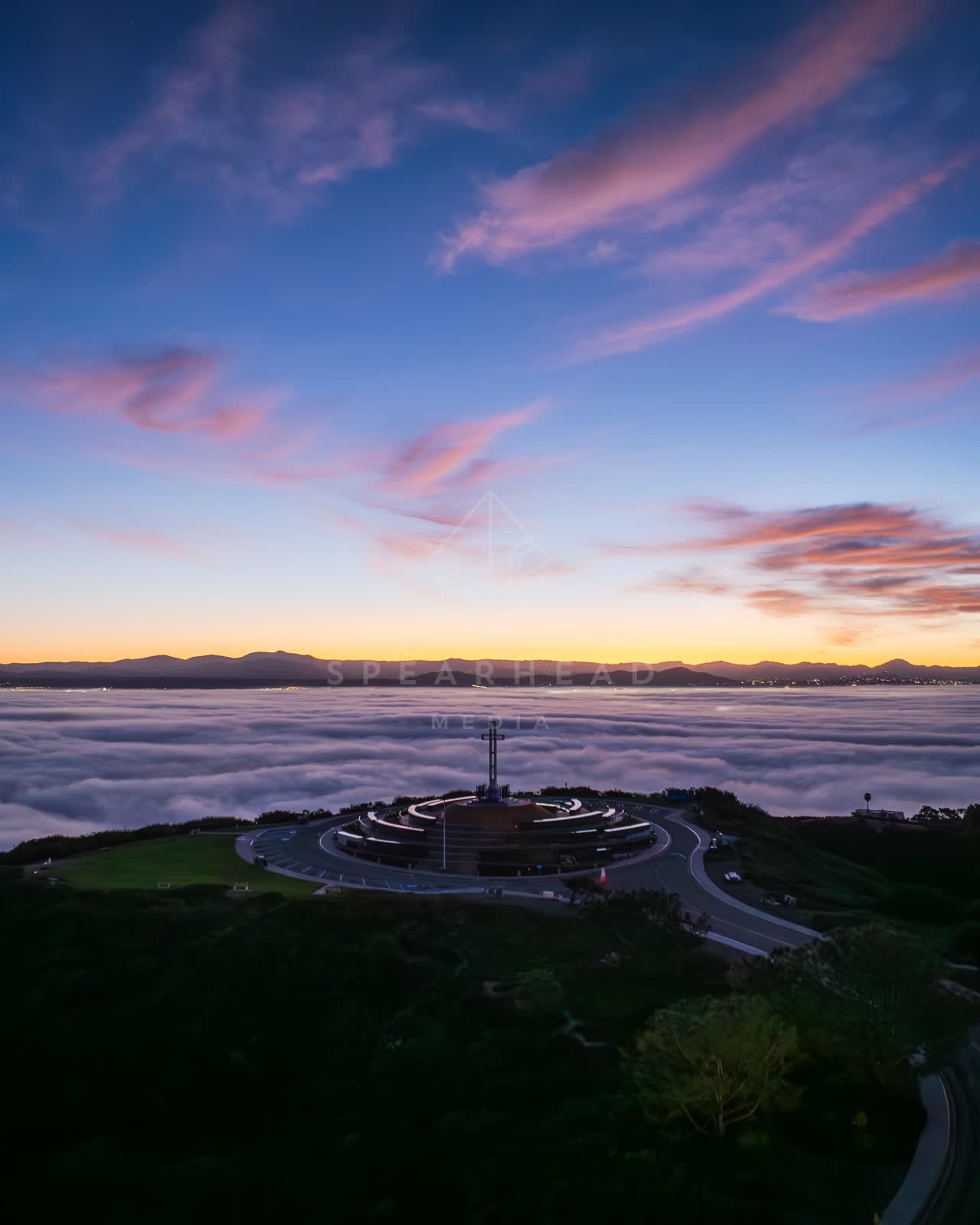 Aerial view of the cliffs, traffic and open country at Mount Soledad.
