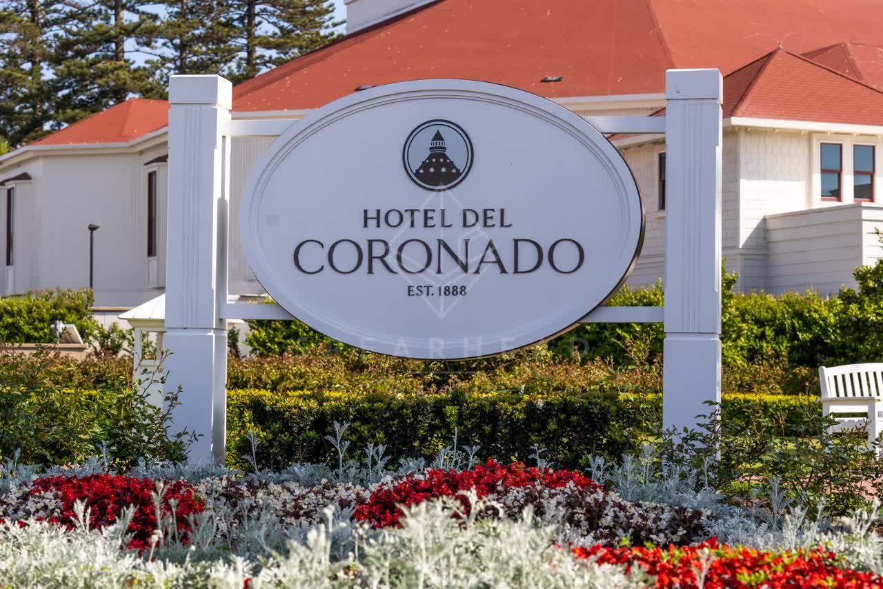 A residential street, the buildings and open country at Coronado Beach.