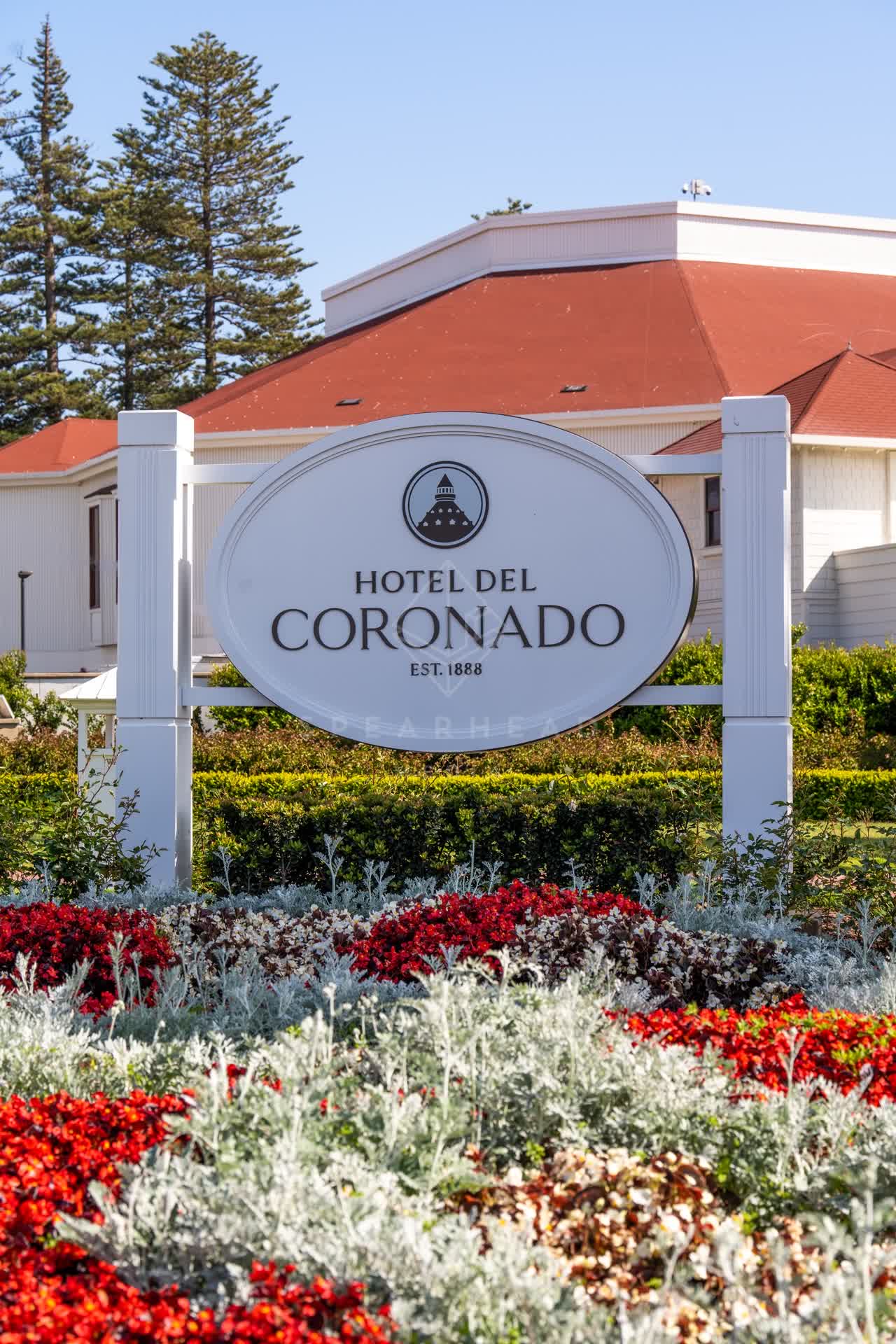 A residential street, the buildings and open country at Coronado Beach.