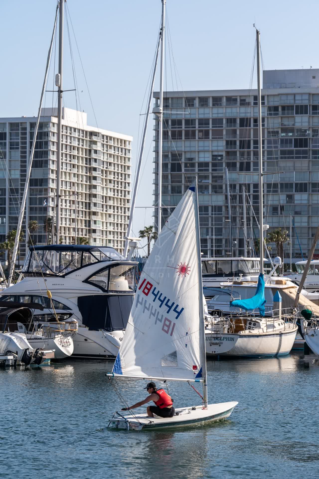 The harbor, boats and the bay at Glorietta Bay, with boats out.