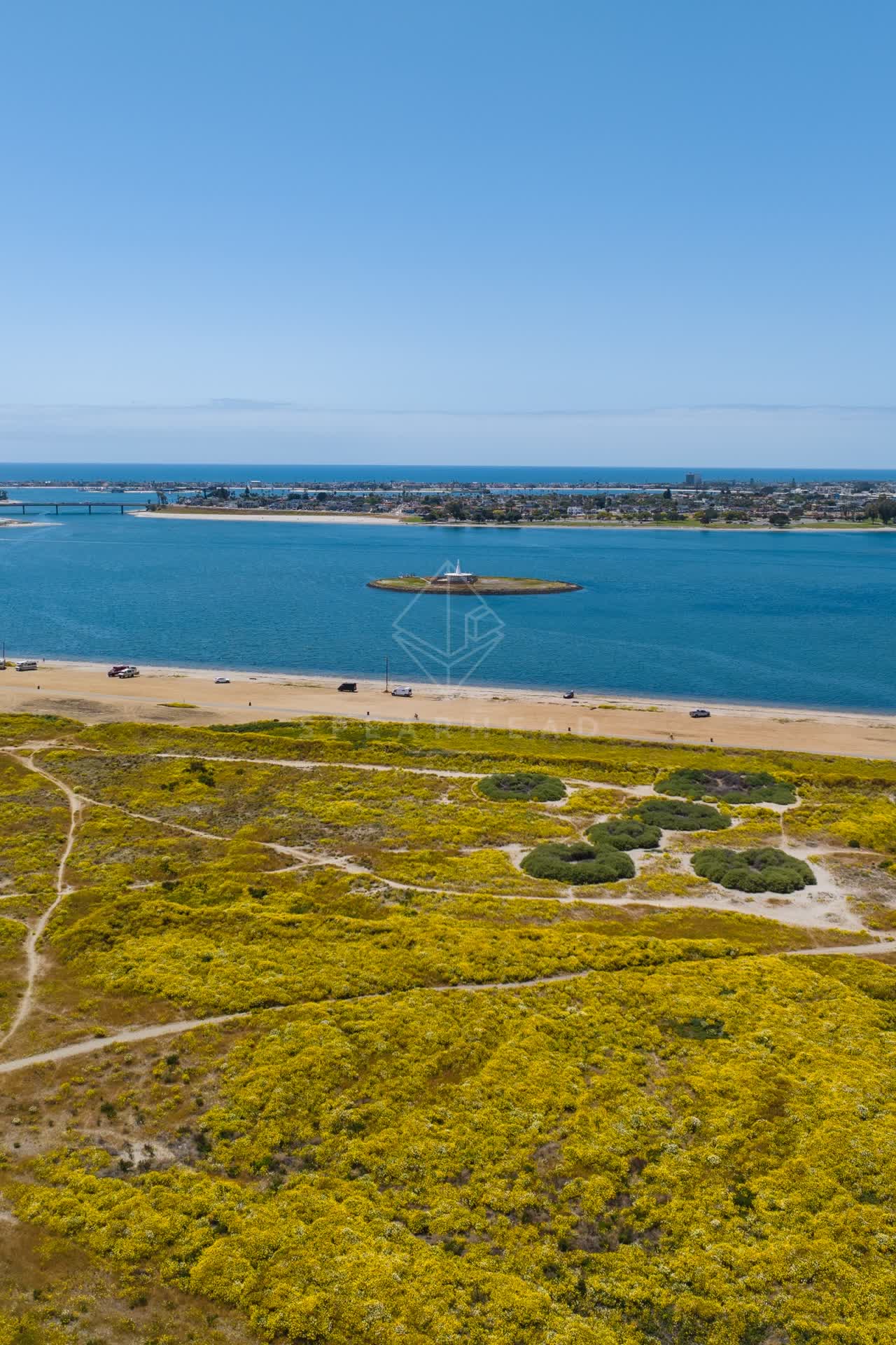 Aerial view of the beach, the ocean and the bay in Mission Bay.