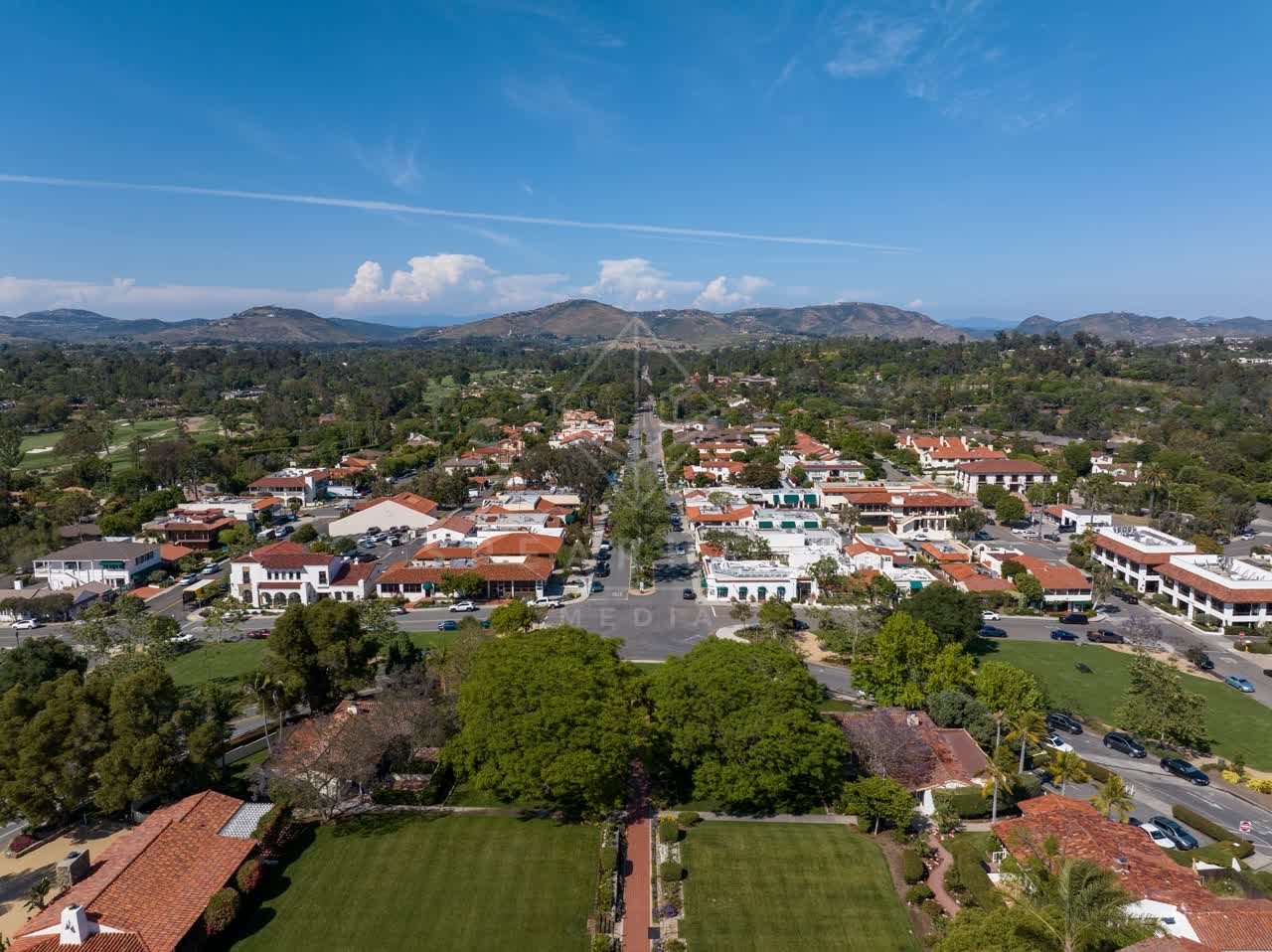 Aerial view of a residential street, homes and the buildings at Covenant.
