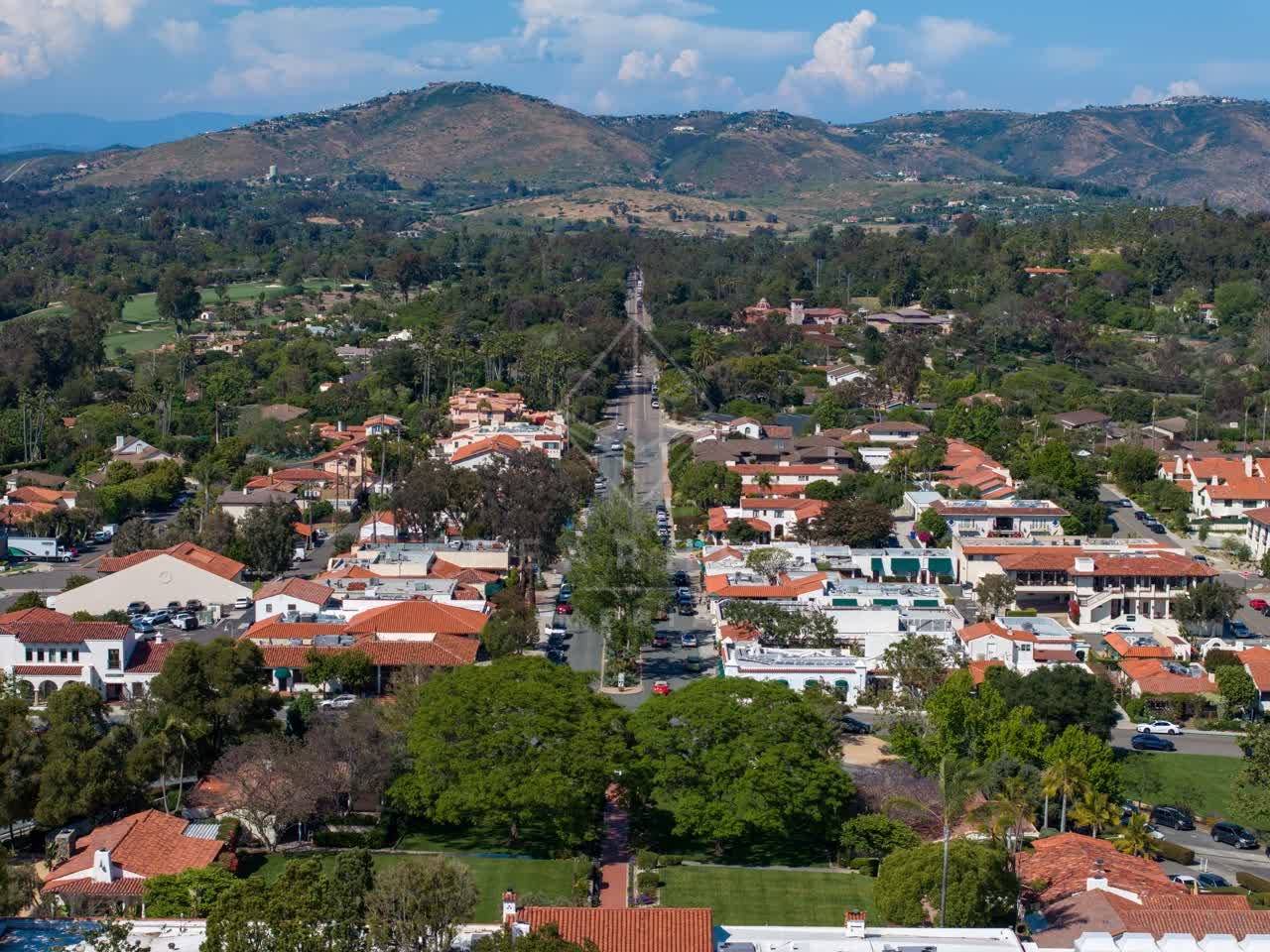 Aerial view of a residential street, homes and the buildings at Covenant.