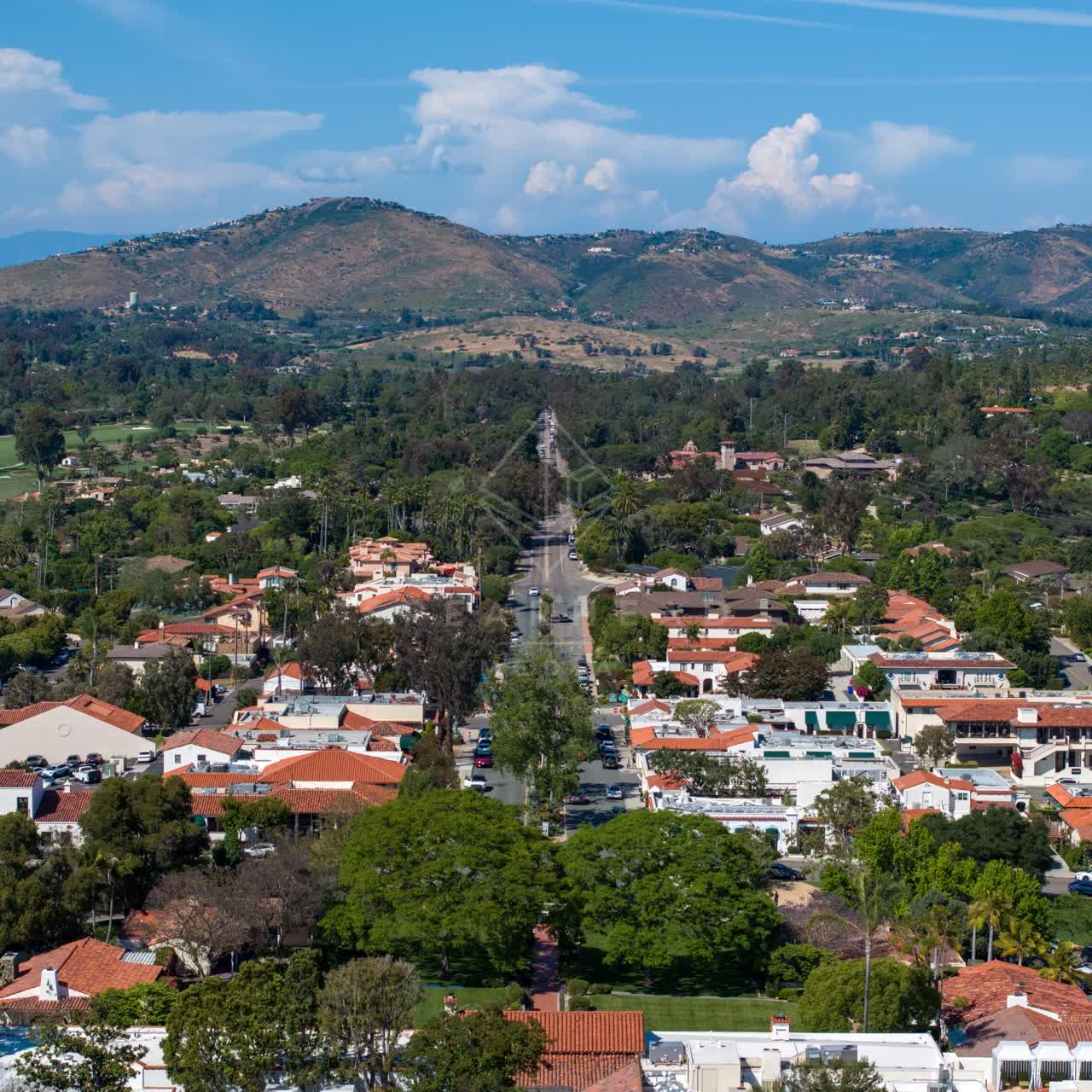Aerial view of a residential street, homes and the buildings at Covenant.